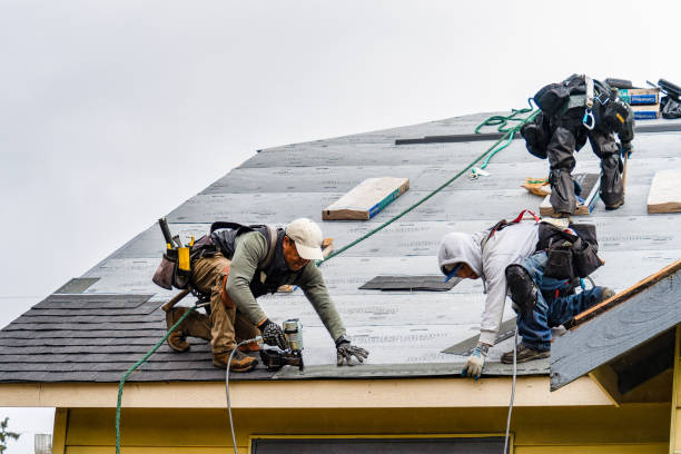 Professional Roofing technician working in West Harwich, MA